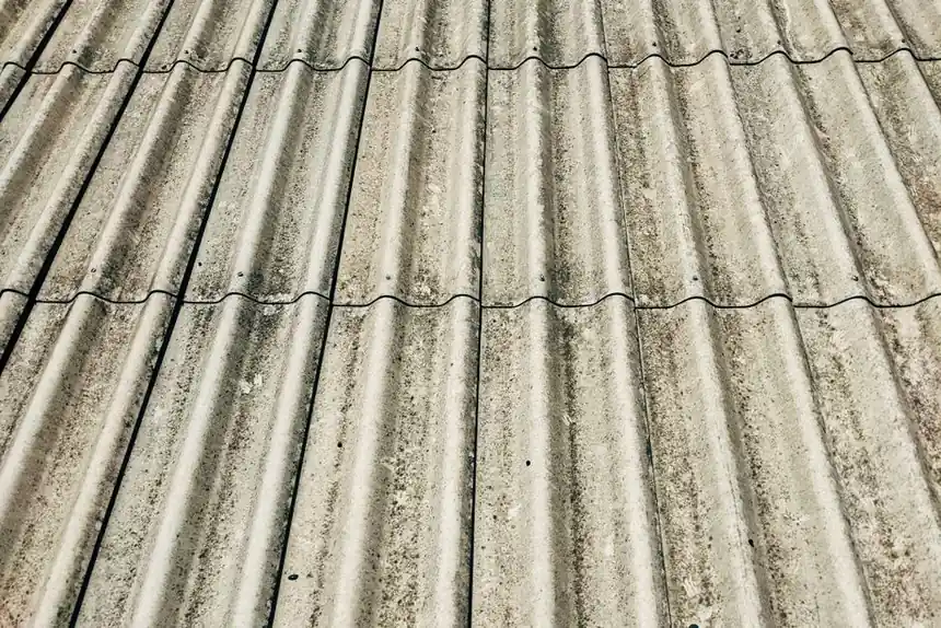 Detailed close-up of a corrugated concrete roof showcasing texture and pattern.
